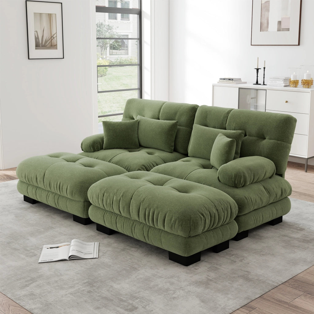 Divano modulare con pouf mobili; seduta profonda e cuscini lombari; in ciniglia verde