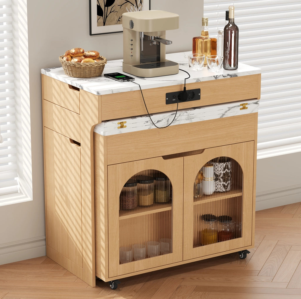 Isola cucina con tavolo estraibile, prese e cassetti