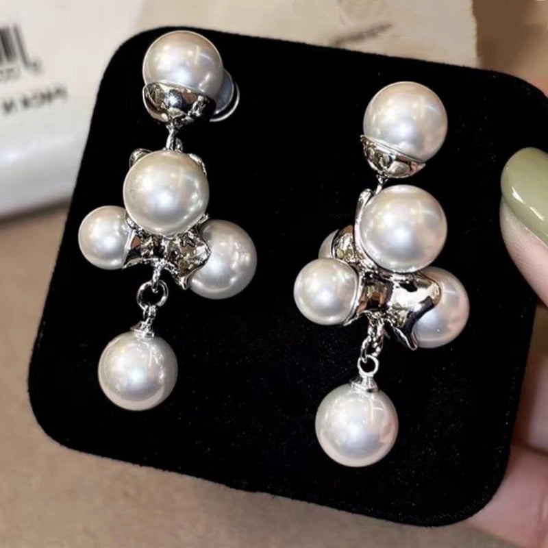 Orecchini pendenti con perle da donna