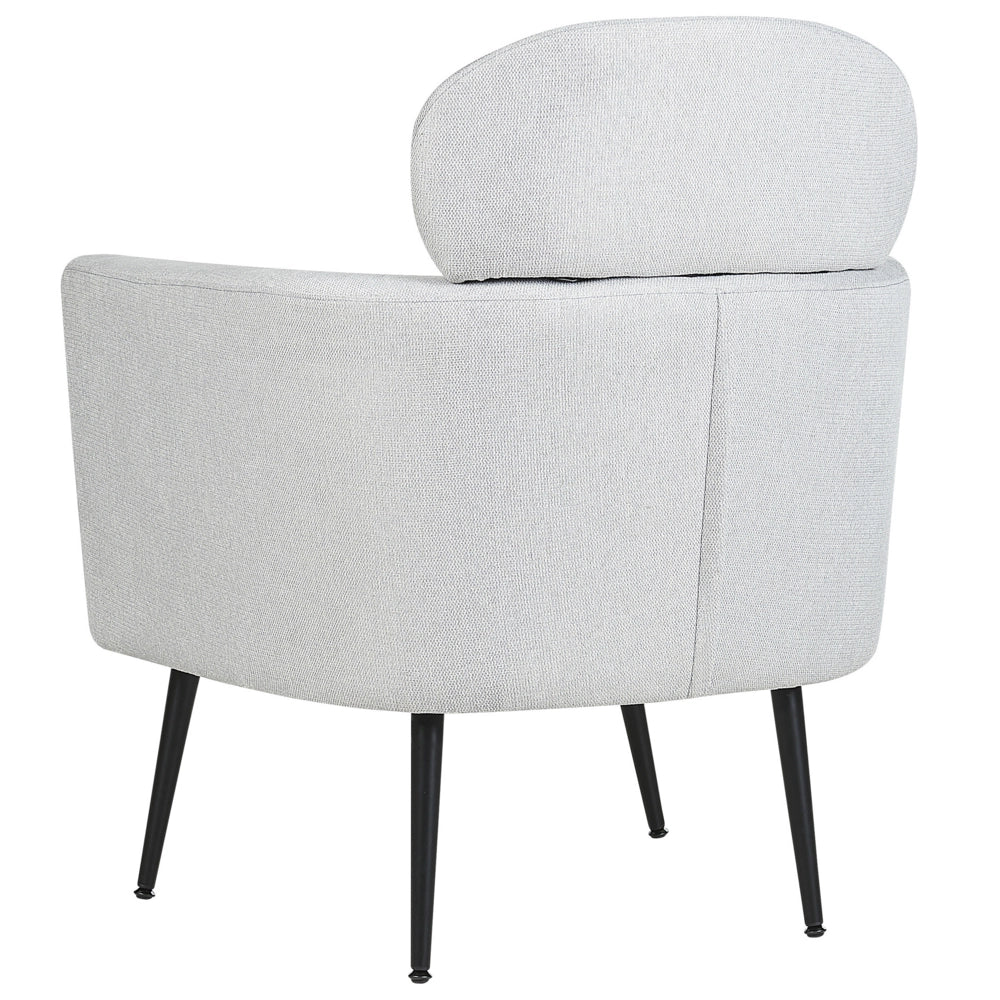 Poltrona da salotto con poggiatesta in tessuto grigio chiaro con gambe nere elegante soggiorno glamour