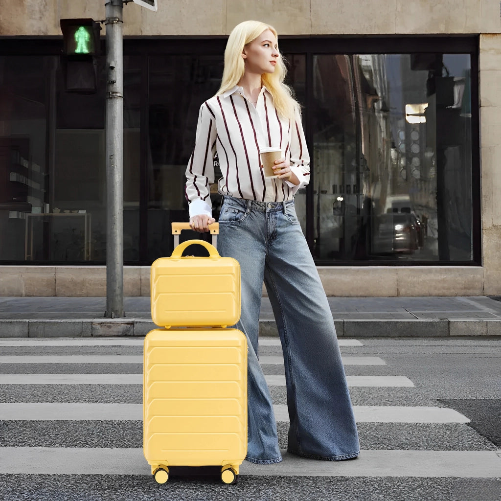 Valigia rigida set da 2 pezzi in ABS con chiusura a combinazione ruote girevoli e beauty case giallo 55 cm