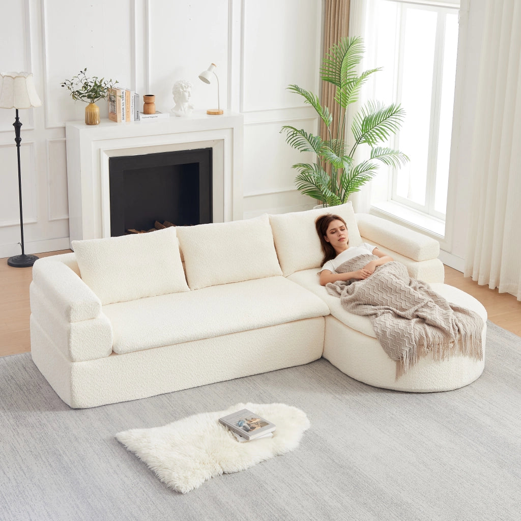 Divano angolare con chaise longue in ciniglia con schienali imbottiti e seduta sagomata a gradoni beige per soggiorno