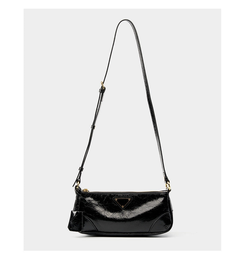 Borsa a tracolla da donna in vera pelle, modello Crescent, alla moda, colore nero.