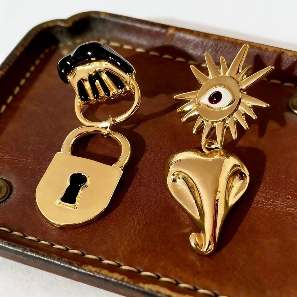 Orecchini vintage asimmetrici a forma di occhio di girasole