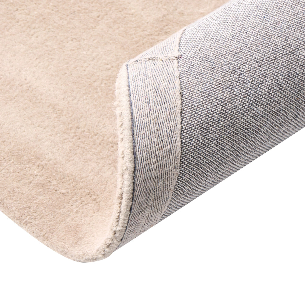 Tappeto in lana beige 140 cm tuftato a mano rotondo design decorativo