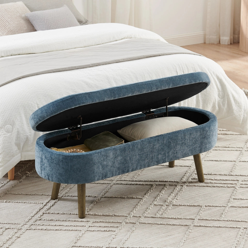 Panca contenitore ovale 110x40x42 cm in chenille blu con 20L di spazio interno