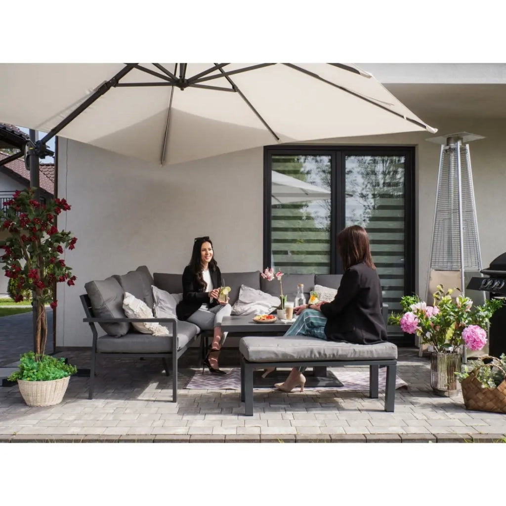 Salotto da giardino ad angolo 7 posti in alluminio grigio con tavolo regolabile e pouf – FERONA