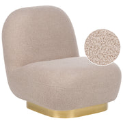 Poltrona beige in tessuto bouclé con base color oro stile contemporaneo moderno soggiorno camera da letto