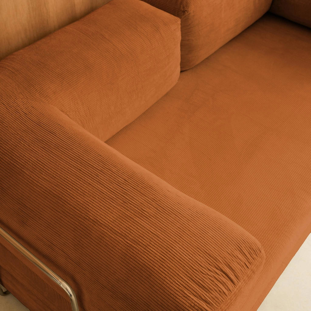 Divano letto futon in velluto a coste e struttura cromata, terracotta