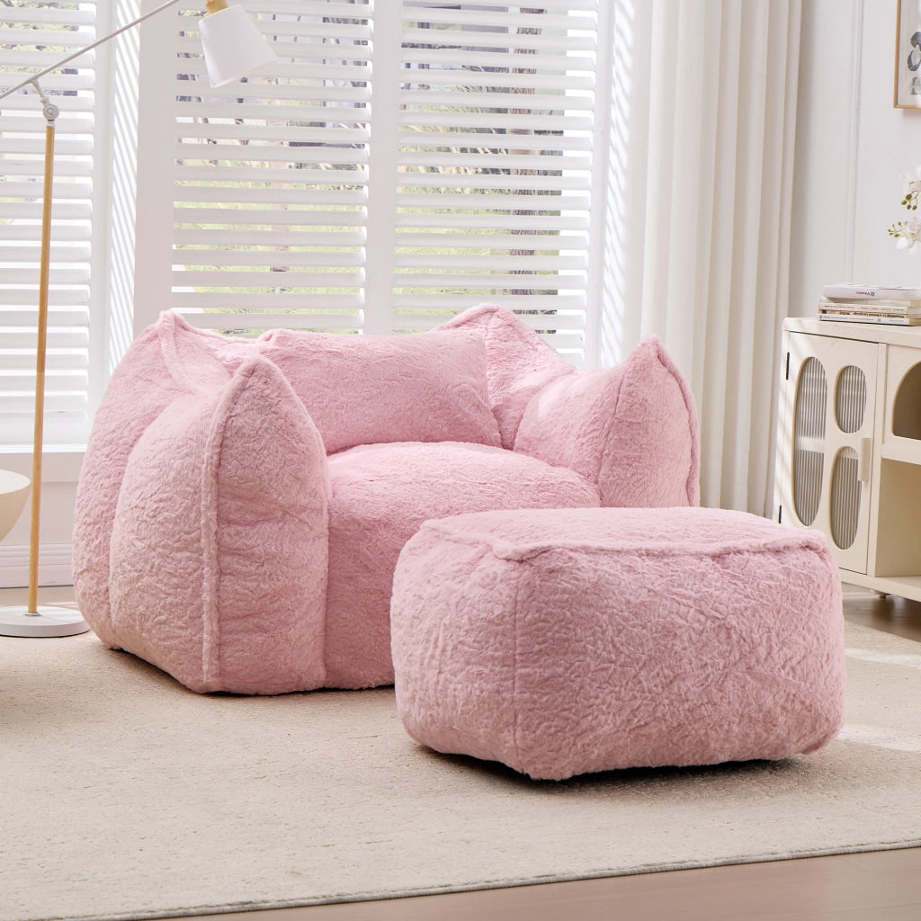 Pouf lounge ergonomico con schienale avvolgente e poggiapiedi per soggiorno e camera da letto in finta pelliccia rosa