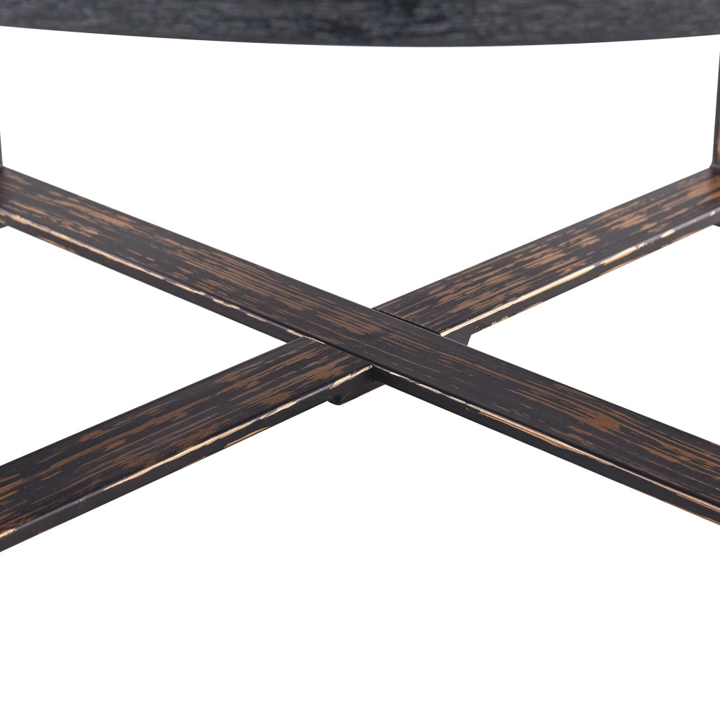 Tavolino rotondo 68x36 cm con piano effetto legno nero; base a croce in metallo; nero