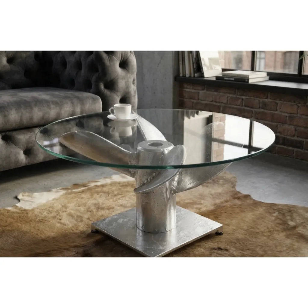Tavolino basso ALUMIA rotondo 70 cm in alluminio argentato e vetro temperato – design industriale con piede a elica
