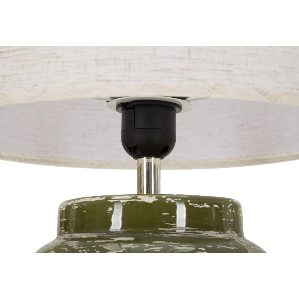 Lampada da tavolo in ceramica verde con paralume in tessuto