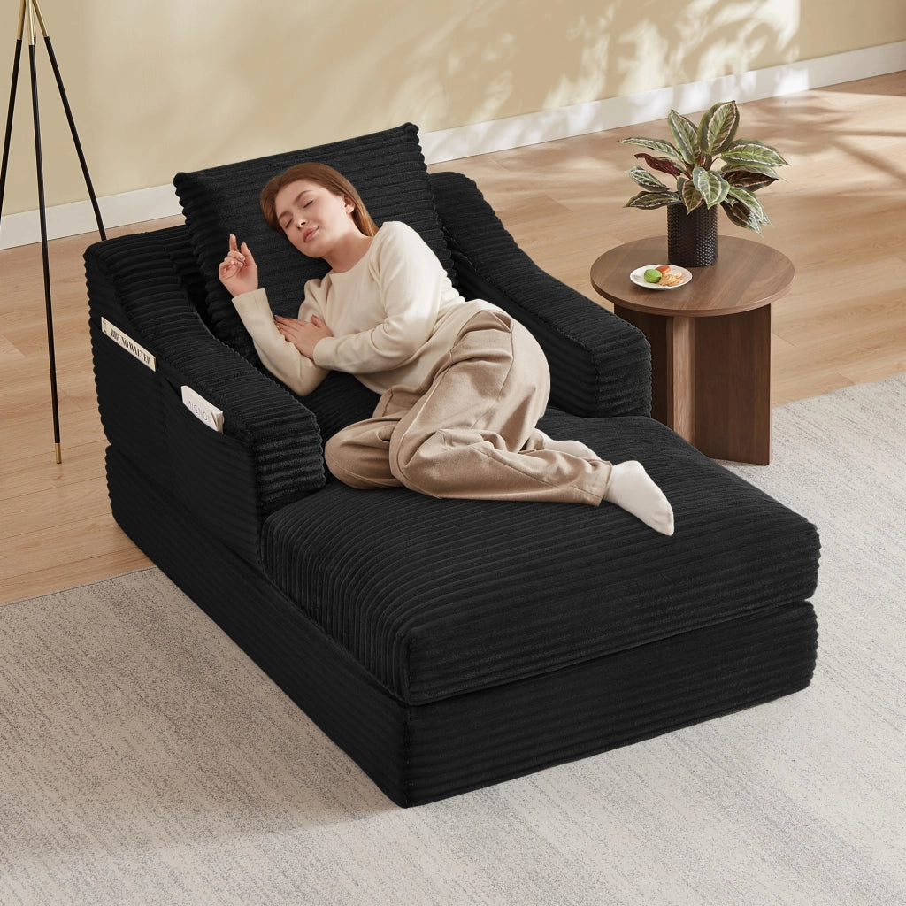 Poltrona lounge in velluto a coste nero con design a doppio strato