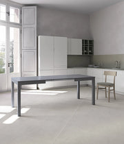 Tavolo Traffic Allungabile 130/210 cm in Melaminico Grigio Scuro con Gambe in Faggio Massello - Design Salvaspazio Moderno