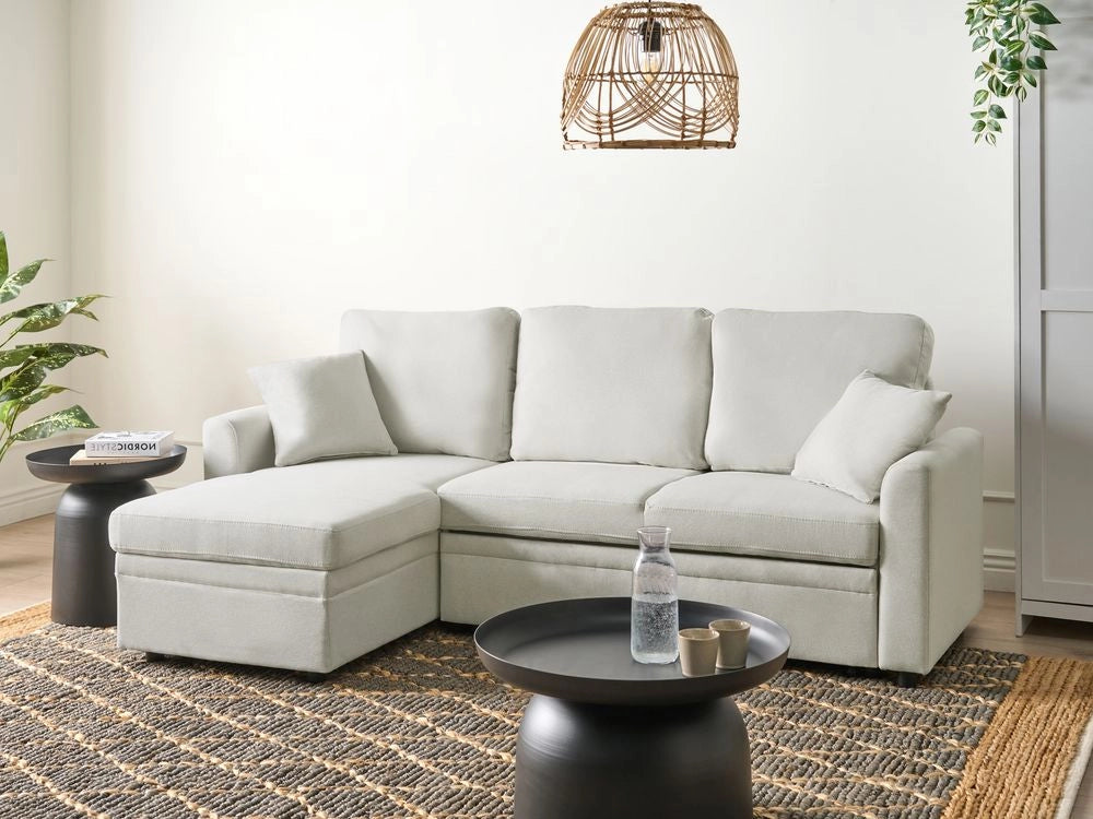 Divano letto angolare con contenitore lato destro beige chiaro rivestimento in poliestere effetto lino contenitore cuscini design moderno