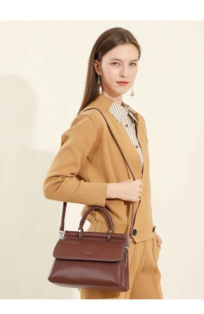 Borsa a mano da donna in vera pelle, colore marrone.