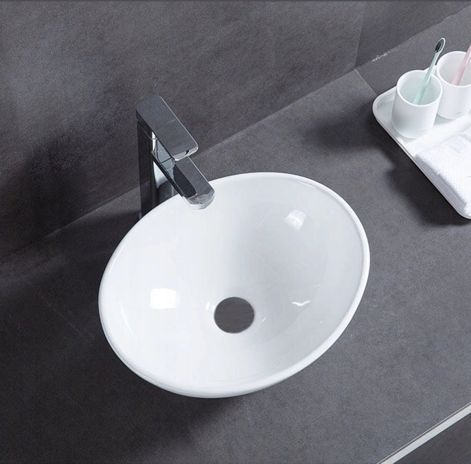 Lavabo da appoggio ovale in ceramica bianca da posizionare su piano 42 x 34 cm
