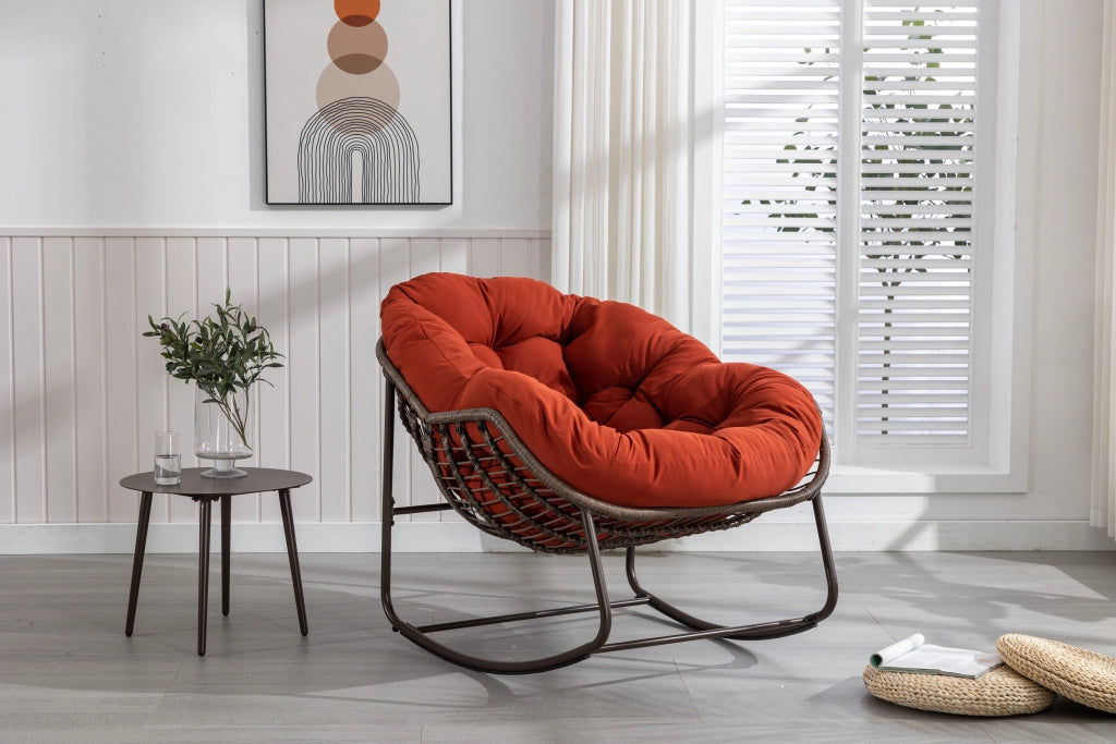 Rocking-chair in rattan sintetico con struttura in acciaio e seduta ergonomica per esterni arancione 78 × 106 × 90 cm