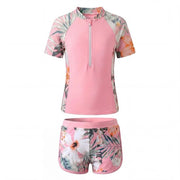 Badpak per Bambine - Due Pezzi - Rashguard con Maniche Corte - Sostegno Preformato - Short da Bagno con Materiali Leggeri - Disegno Fiorale - Cerniera per Maggiore Comodità - Due Pezzi