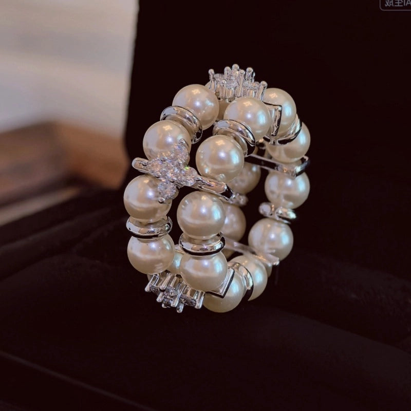 Anello con diamanti a doppio strato e perline