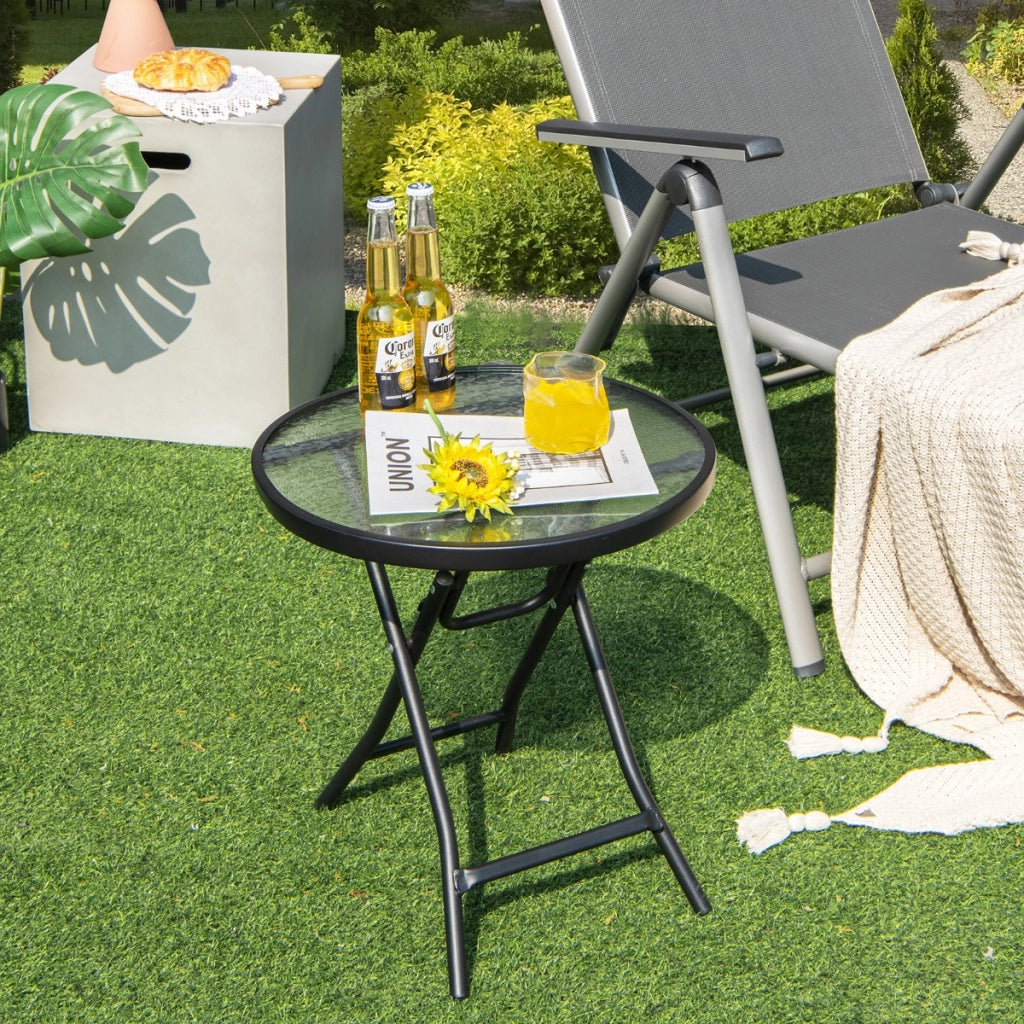 Tavolo rotondo da pranzo per patio con piano in vetro temperato, Tavolo con telaio antiruggine e struttura a X-Tavoli da esterno
