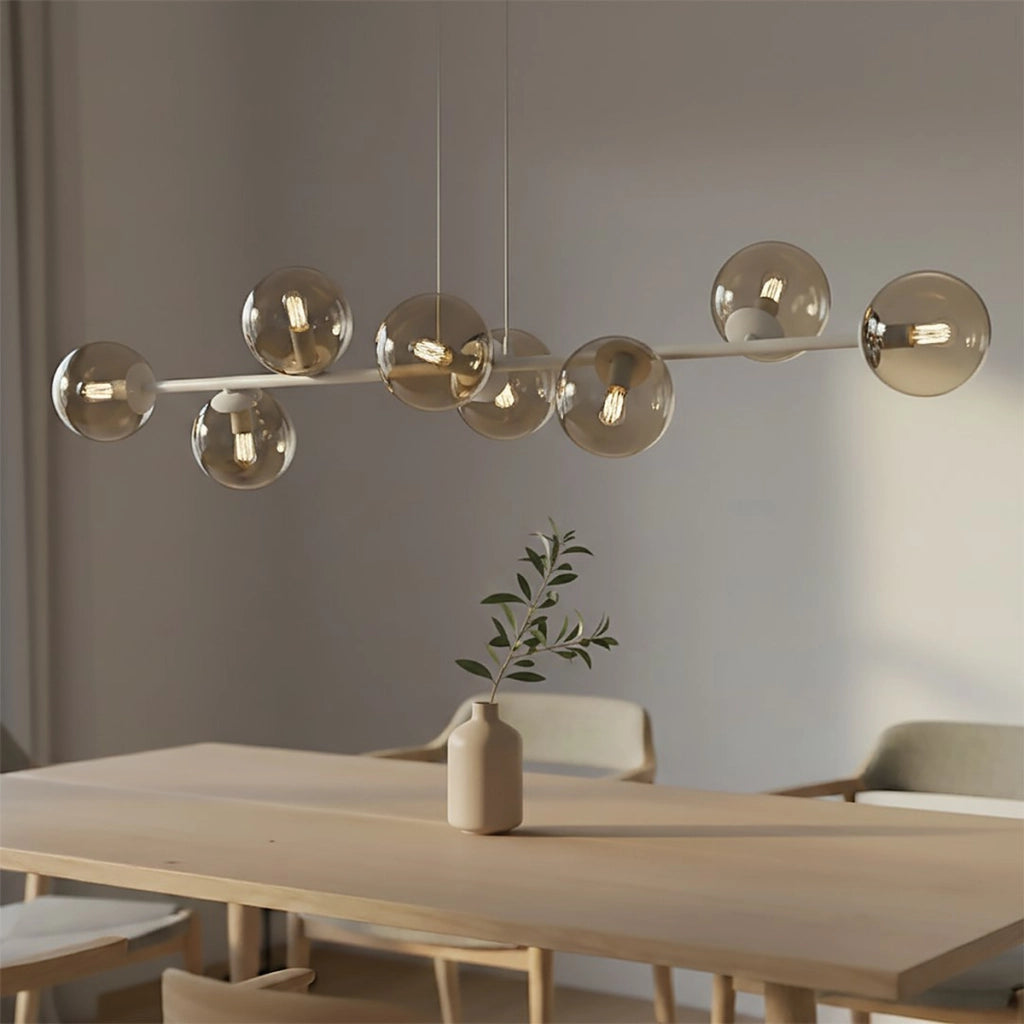 Lampada a sospensione Magnus in acciaio beige e vetro ambrato