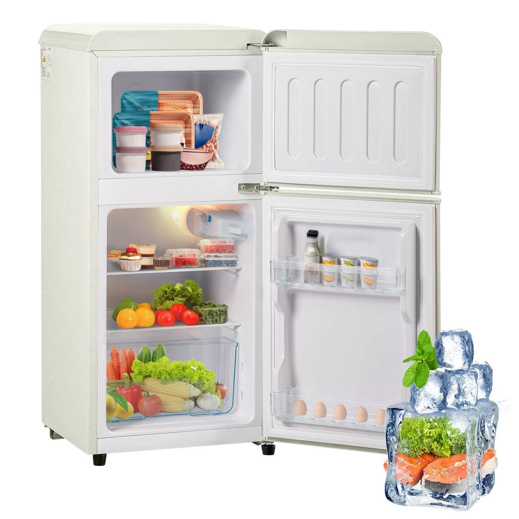 Frigorifero/congelatore in stile retr¨°. Altezza 88,8 cm, larghezza 45,5 cm, due porte, capacit¨¤ totale 60 litri, scomparto congelatore 22 litri.