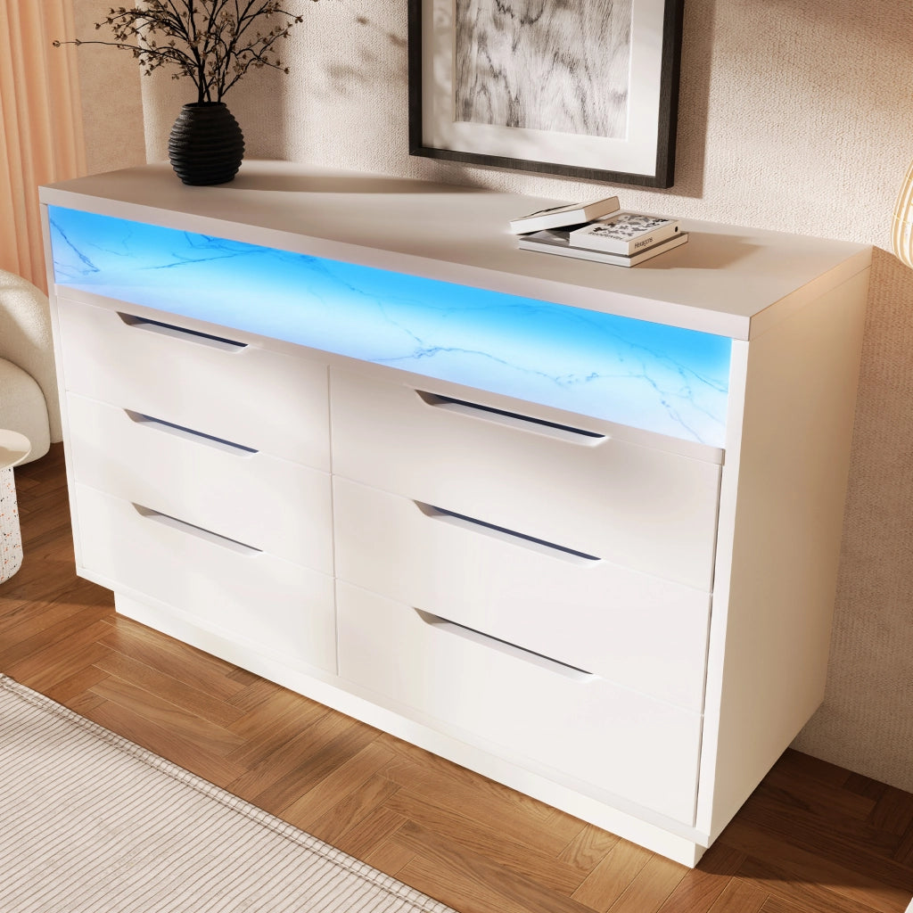 Credenza moderna bianca con 6 cassetti, illuminazione LED e vano aperto in effetto marmo, 120x40x85 cm