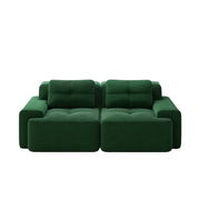 divano modulare lounge con seduta profonda; ampi braccioli; in velluto a coste; verde