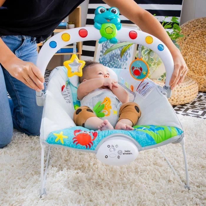 BABY EINSTEIN Sedia a sdraio Neptune - Ocean Explorers, 15 melodie, luci, vibrazioni