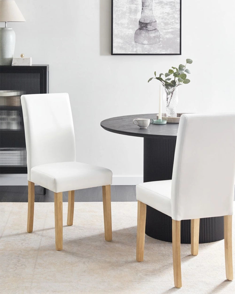 Set di 2 sedie da pranzo bianche con gambe in legno ecopelle moderne
