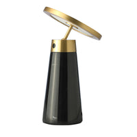 Lampada da tavolo in marmo nero e acciaio dorato