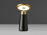 Lampada da tavolo in marmo nero e acciaio dorato