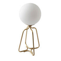 Lampada da tavolo in acciaio dorato e vetro bianco