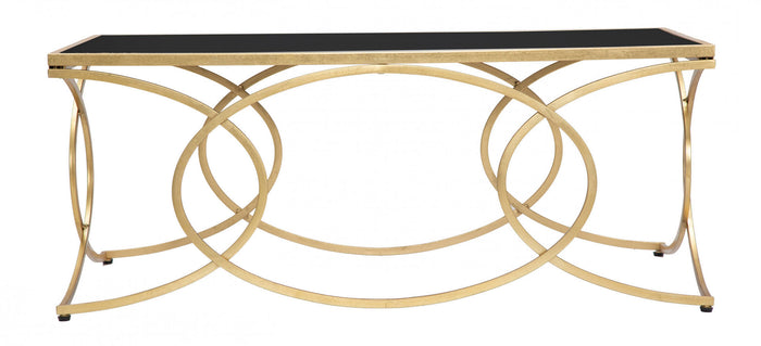 Tavolo elegante da Caffè rettangolare, struttura in metallo dorato, con ripiano in vetro temprato, colore nero, Misure 60 x 45 x 110 cm