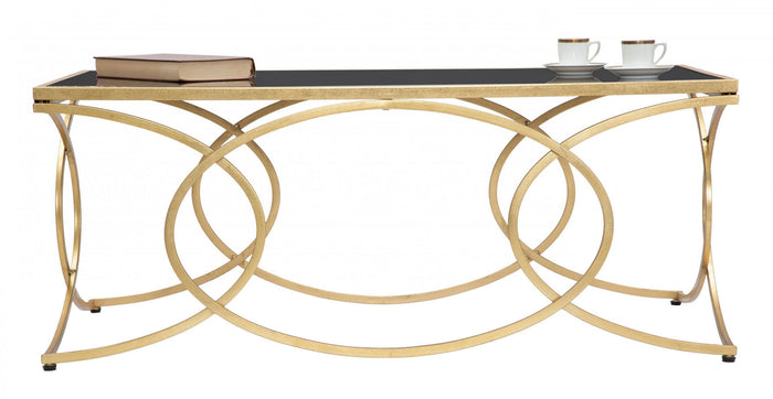 Tavolo elegante da Caffè rettangolare, struttura in metallo dorato, con ripiano in vetro temprato, colore nero, Misure 60 x 45 x 110 cm