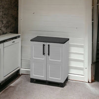 Mobiletto multiuso da esterno o Anthony, Armadio basso a 2 ante e 1 ripiano in polipropilene, 100% Made in Italy, cm 68x37h90, colore Grigio chiaro
