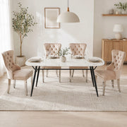 Sedia da pranzo imbottita in velluto beige con struttura in metallo e schienale decorativo