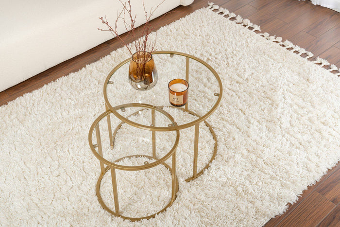 Set di 2 tavolini da salotto Xaden, Tavolo basso da caffè, Portariviste per divano, Ripiano da soggiorno, 60x60 h43 cm, Oro e Trasparente