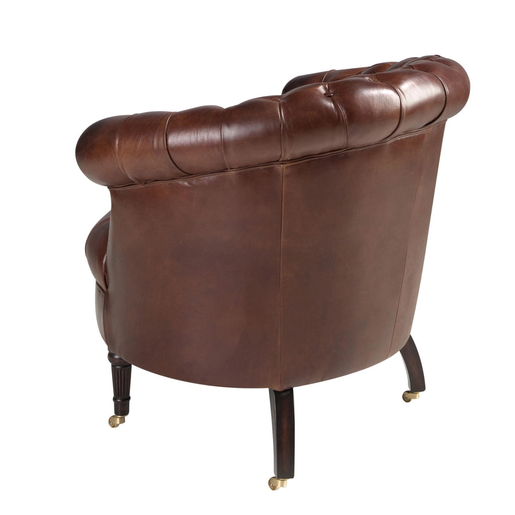 Poltrona Chester con seduta circolare in pelle marrone cognac
