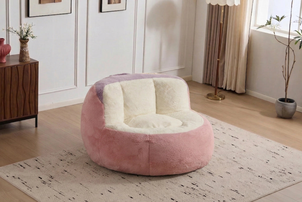 Poltrona pouf con imbottitura in schiuma sminuzzata, maniglia e base antiscivolo, in pelliccia sintetica multicolore