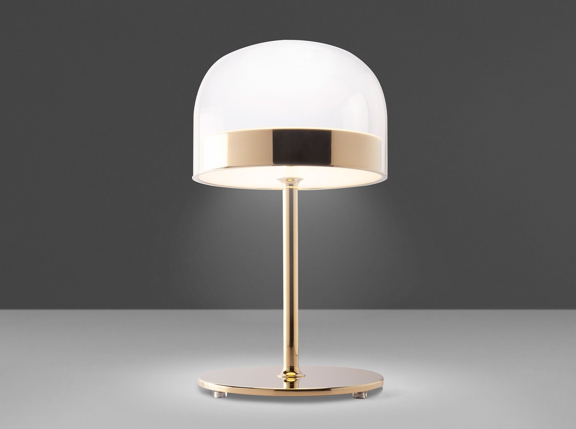 Lampada da tavolo in acciaio e vetro trasparente