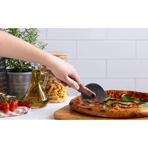 Tagliapizza puperoni cane con frisbee