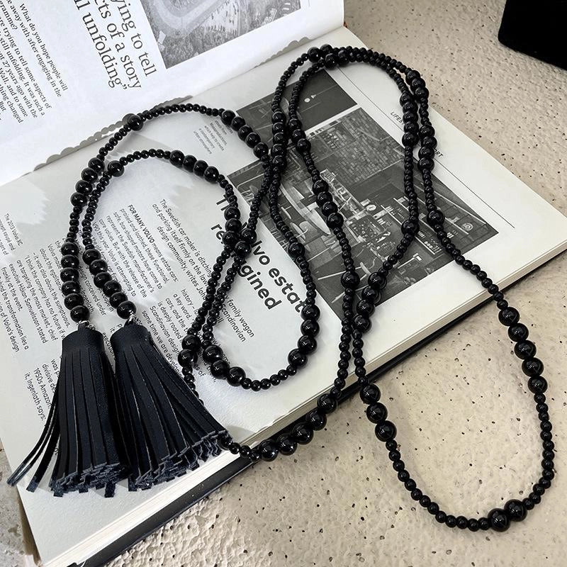 Collana lunga vintage con perline nere e nappa, regalo di Natale o compleanno.