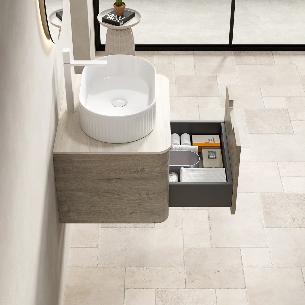 Mobile bagno sospeso con lavabo ovale e cassetto ammortizzato; piano in pietra sinterizzata; 60×46×50.2 cm