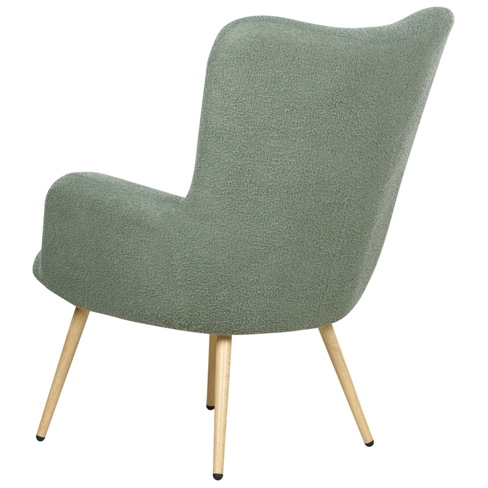 Poltrona rivestita in tessuto verde chiaro con motivo floreale con poggiapiedi in stile retrò