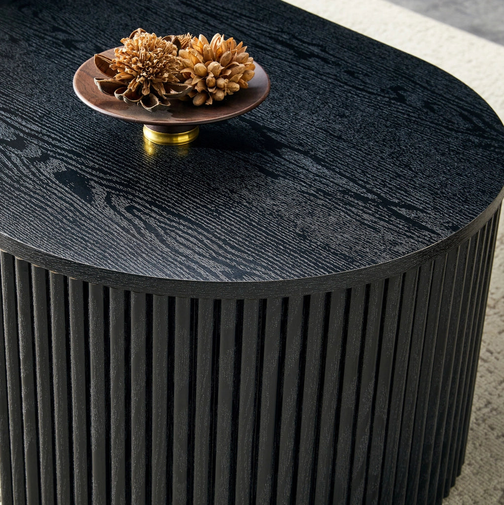 Tavolino da caffè ovale 118x65x17 cm con cassetto estraibile e scanalature verticali in MDF nero