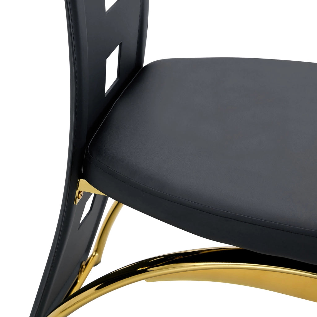 Set di 2 sedie da pranzo con schienale traforato; PU nero e gambe dorate