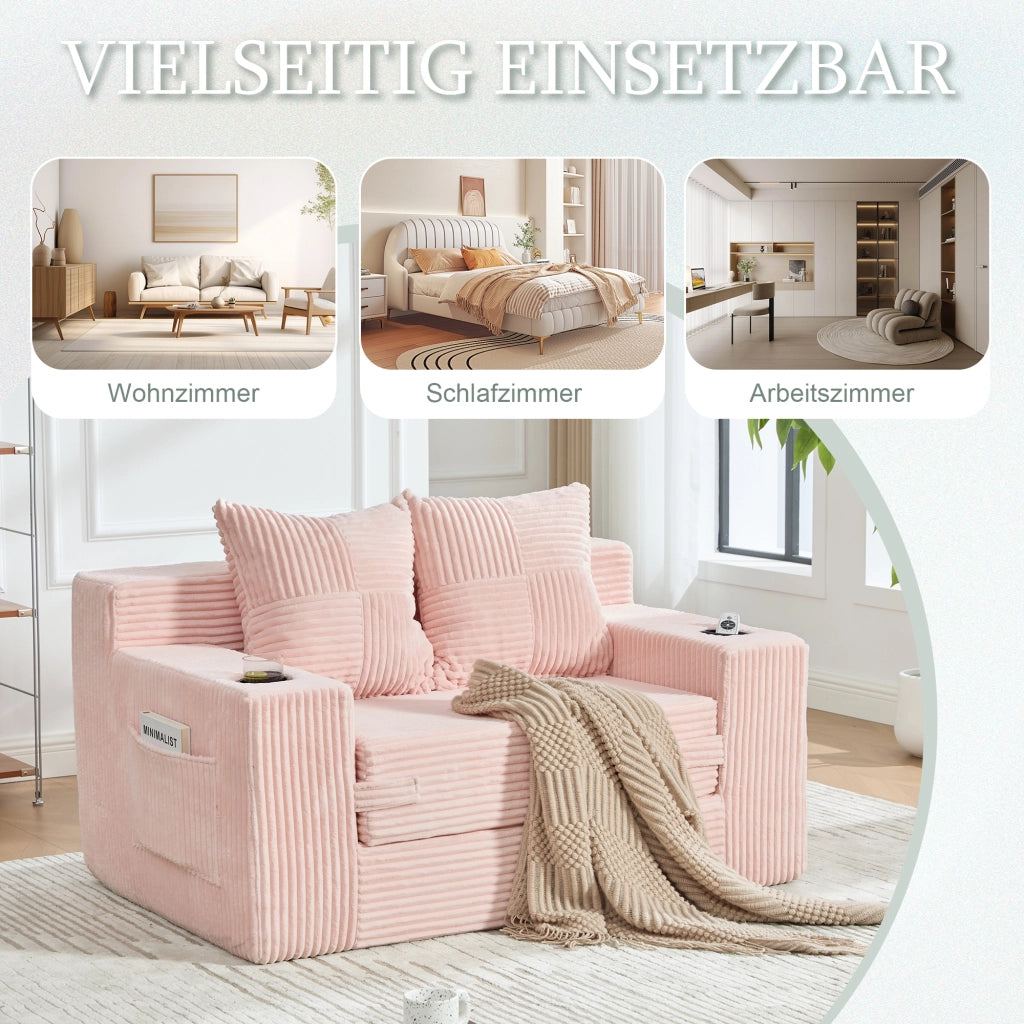 Divano pouf in velluto a coste rosa con due cuscini tasche laterali e braccioli